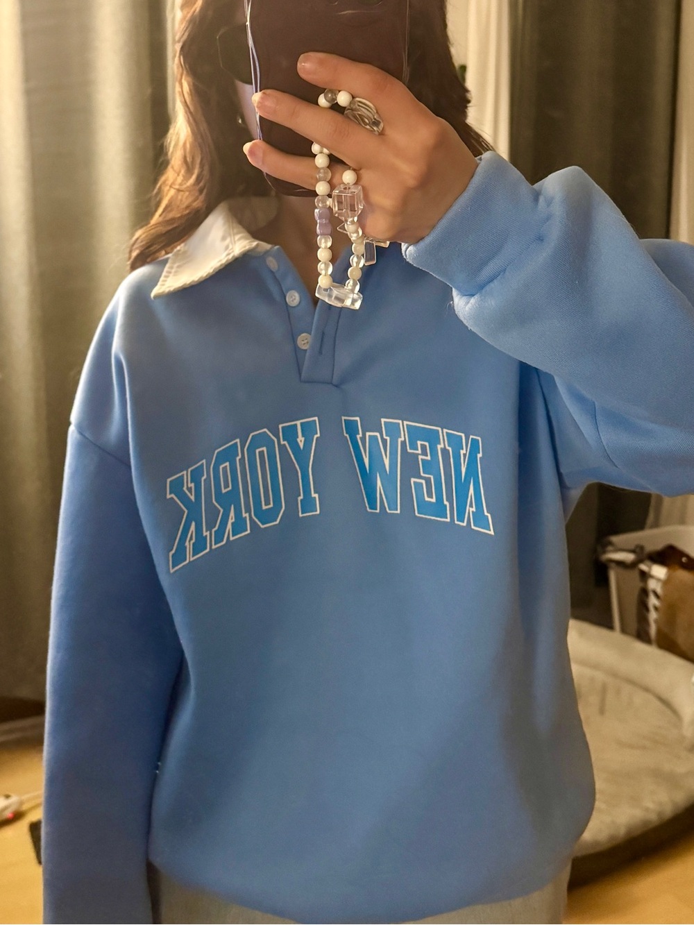 Blue "New York" Sweater with a white Collar